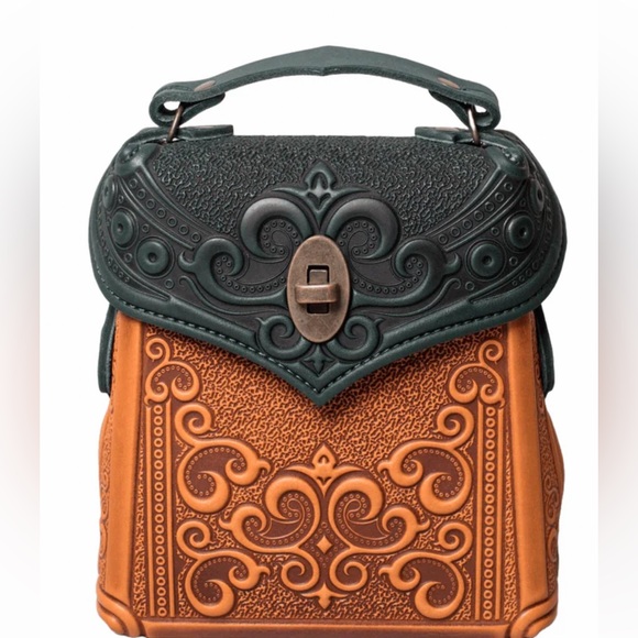 Tory Burch Handbags - NEW! Embossed Leather Mini Backpack Brand New.